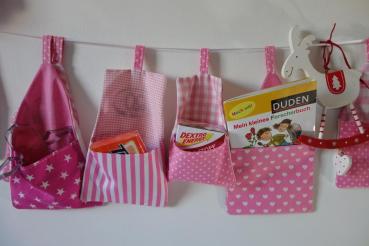 Genähter Adventskalender Stoffhäuser Weihnachtsdorf rosa pink